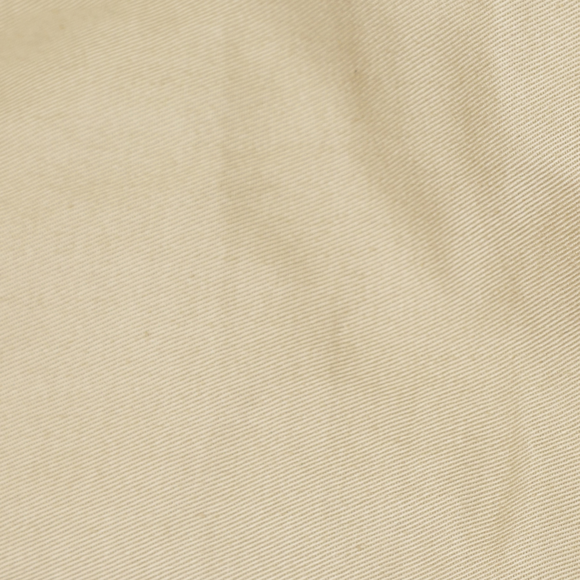 Närbild tyg i beige